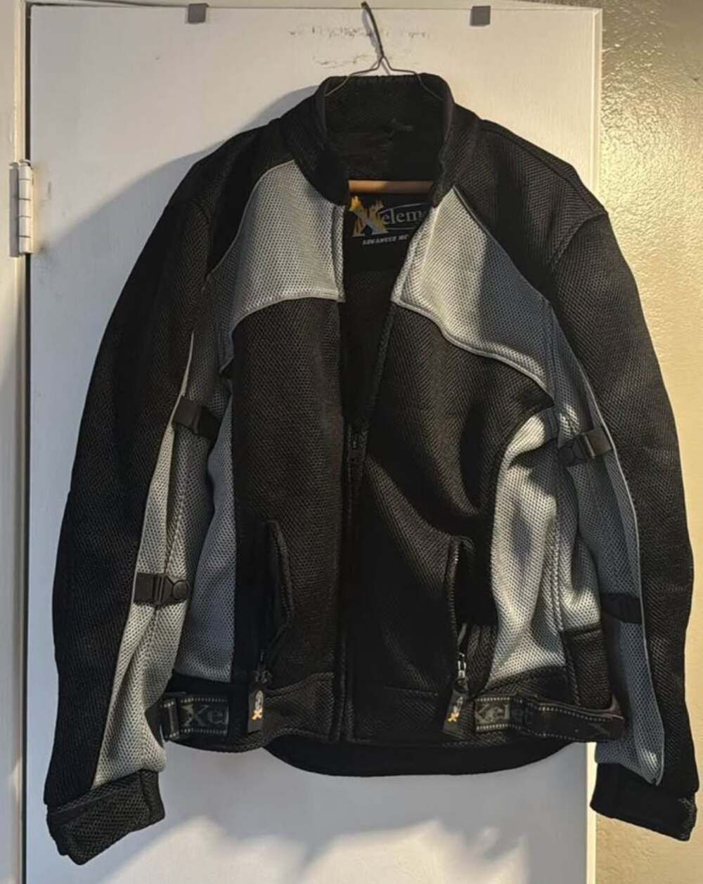 Xelement Advanced Motorcycle Gear Black and Silver Mesh Sport Jacket